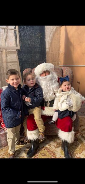 Cute children visit Santa